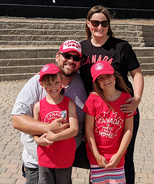 Ross-Stewart and Charbonneau with their kids during a trip to Winnipeg.